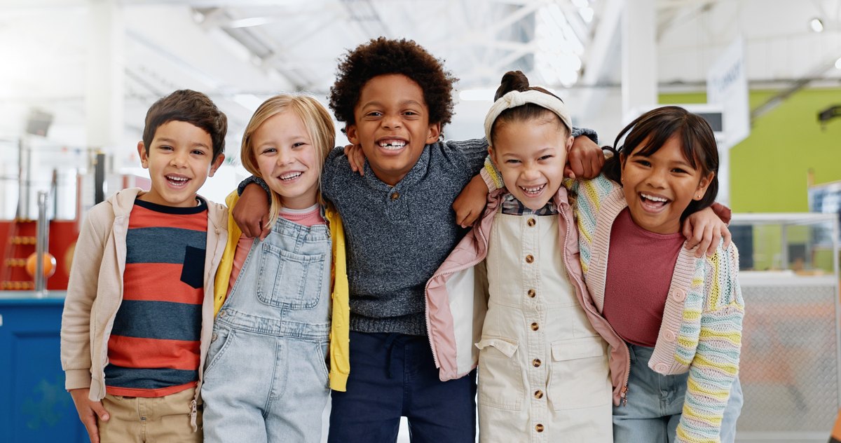 A group of smiling, happy children together